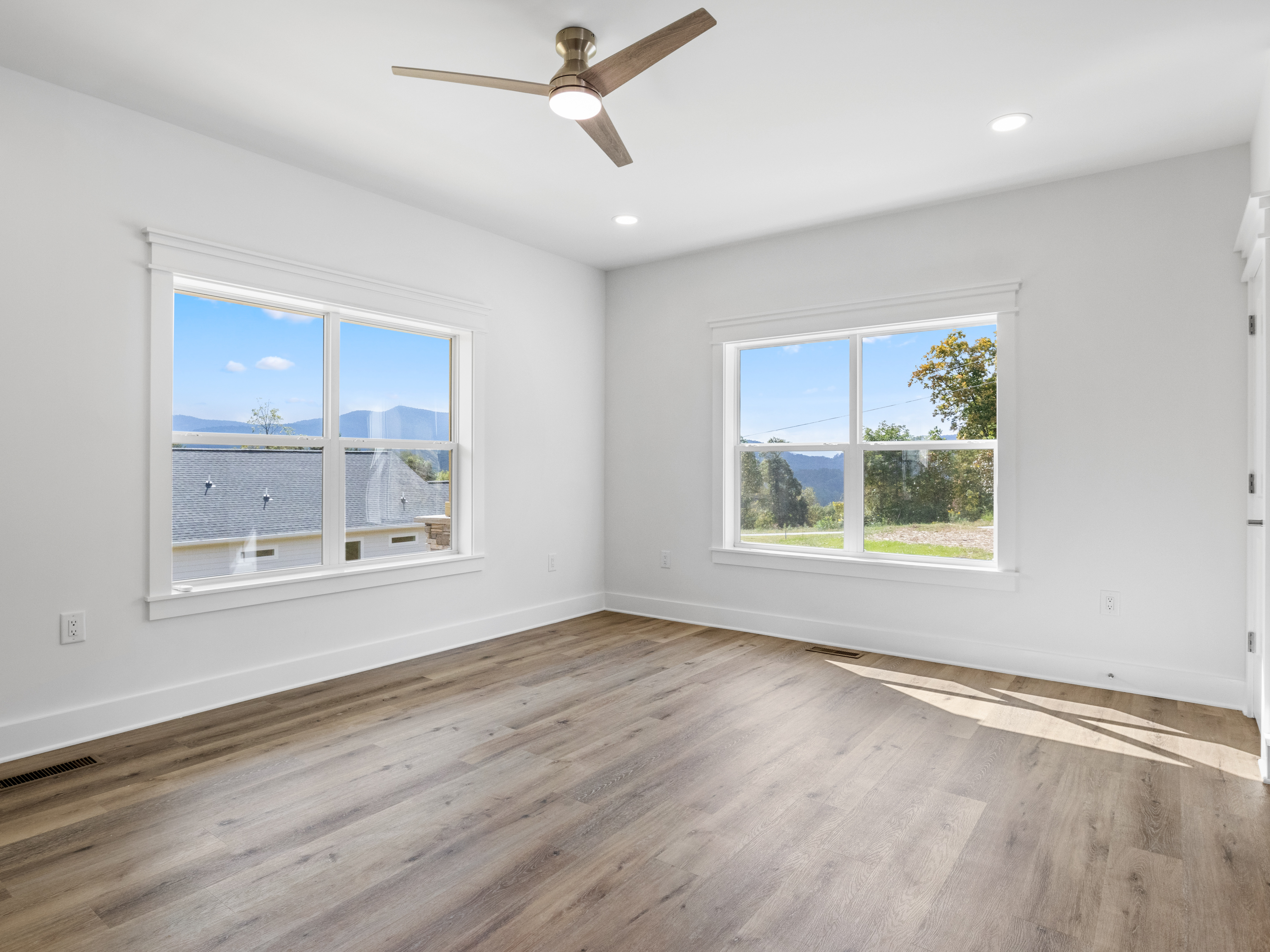 Before: Empty living room on Overlook Drive, Spruce Pine NC